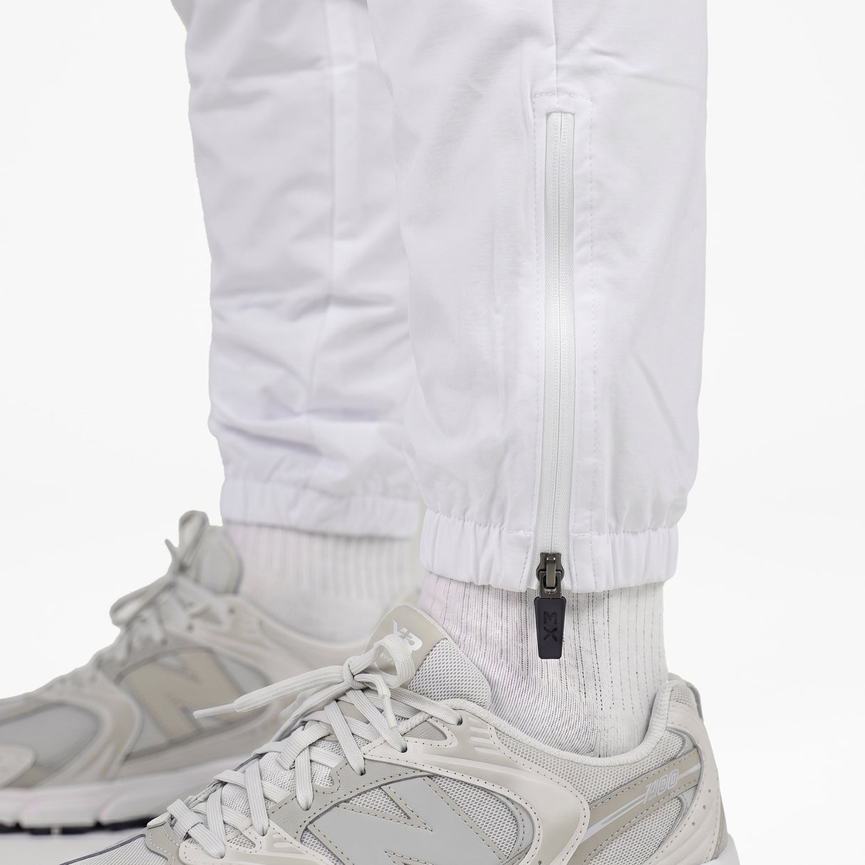 GEORGIA Bianco- Pantalone in nylon con zip alle caviglie- mid season
